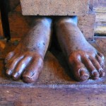 Detail of restored caryatid's feet on early-18th-century fireplace at Moor Park house, Rickmansworth, Hertfordshire