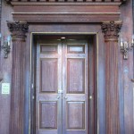 Restored early-18th-century classical door surround at Moor Park house, Rickmansworth, Hertfordshire